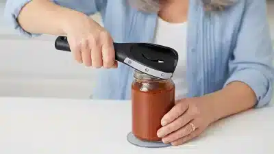 jar opener for seniors with weak hands opening a pickle jar